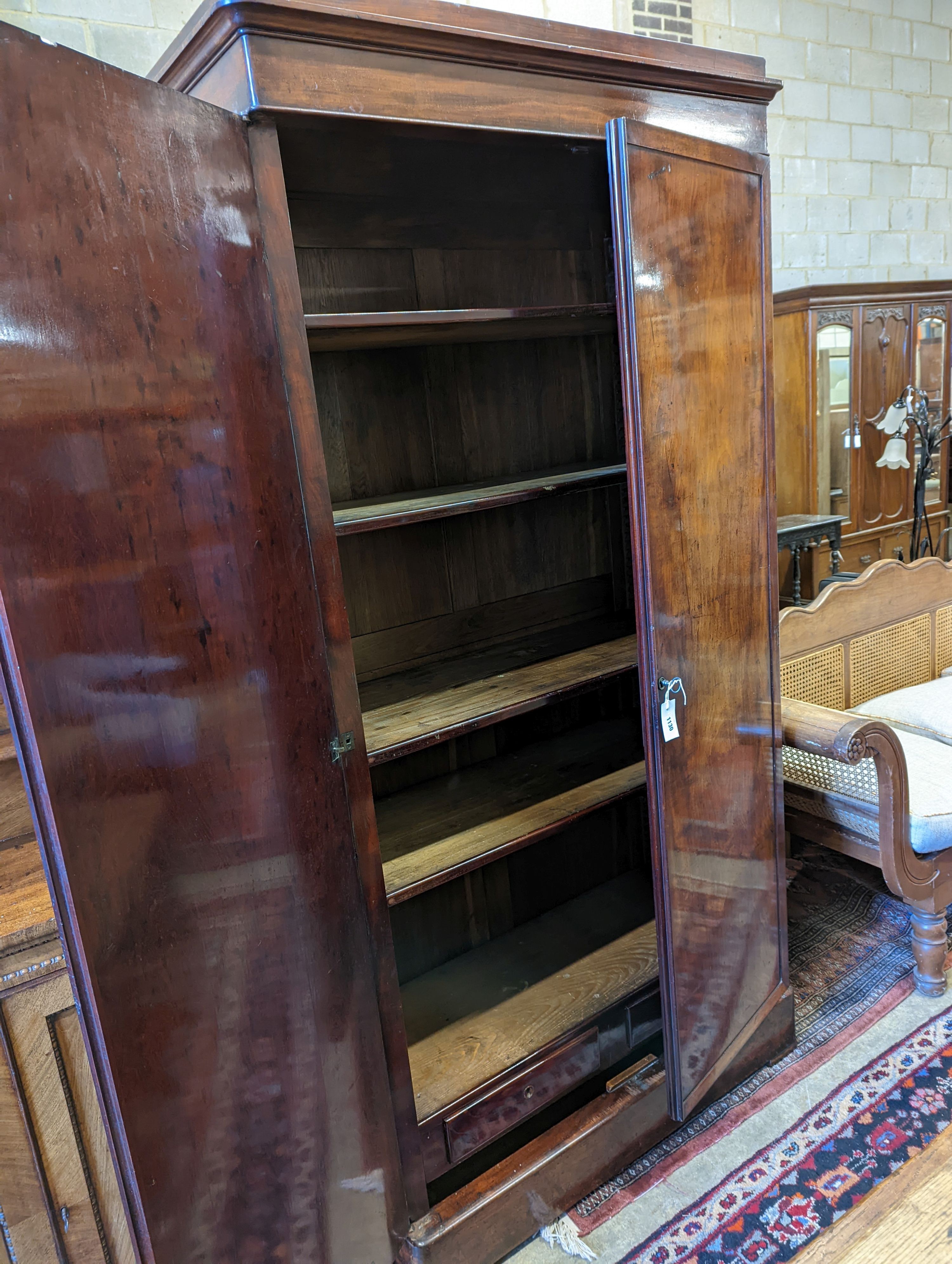 A 19th century French mahogany armoire, width 108cm, depth 47cm, height 213cm